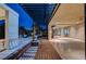 Expansive backyard patio with modern design, pergola, and outdoor entertainment space at 1704 Tangiers Dr, Henderson, NV 89012