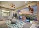 Relaxing covered balcony featuring modern railing and outdoor seating with sunset views at 1704 Tangiers Dr, Henderson, NV 89012