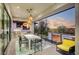Beautiful balcony featuring outdoor grill, dining area, and scenic sunset views at 1704 Tangiers Dr, Henderson, NV 89012