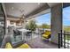 A covered balcony features an outdoor kitchen and dining area for entertaining at 1704 Tangiers Dr, Henderson, NV 89012