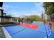 Private backyard featuring a vibrant basketball court with a pool and luxurious outdoor amenities at 1704 Tangiers Dr, Henderson, NV 89012