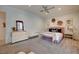 Bedroom featuring a comfortable bed, stylish decor, and ample natural light at 1704 Tangiers Dr, Henderson, NV 89012
