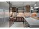 Close-up of the gourmet kitchen with stainless steel appliances, a white countertop, and modern cabinetry at 1704 Tangiers Dr, Henderson, NV 89012