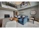 Open living room with high ceilings, stylish furnishings, and an abundance of natural light at 1704 Tangiers Dr, Henderson, NV 89012