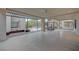 A spacious open patio leads to a modern outdoor living space and spiral staircase at 1704 Tangiers Dr, Henderson, NV 89012