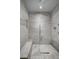 Modern shower featuring a large rain head, sleek fixtures and spacious bench at 1704 Tangiers Dr, Henderson, NV 89012