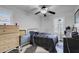 Standard bedroom features ceiling fan, shuttered window, and natural light at 193 Calabria Peak Ct, Henderson, NV 89012
