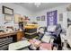 Bedroom cluttered with furnishings, storage bins and a desk at 193 Calabria Peak Ct, Henderson, NV 89012