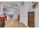 Bright entryway with a staircase, storage cabinet, and view of the open living area at 193 Calabria Peak Ct, Henderson, NV 89012