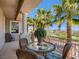 Upstairs balcony with wrought iron railing overlooks a golf course, with seating for outdoor enjoyment at 2038 Cherry Creek Cir, Las Vegas, NV 89135