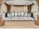 Luxury bathtub set below an arched window and decorative pillars at 2038 Cherry Creek Cir, Las Vegas, NV 89135