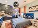 Star Wars themed bedroom with blue walls, character-themed bedding, and Star Wars mural at 2038 Cherry Creek Cir, Las Vegas, NV 89135
