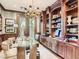 A home office that features custom built-in shelves, a stylish desk, and natural light at 2038 Cherry Creek Cir, Las Vegas, NV 89135