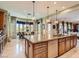 Spacious kitchen that features an expansive island, natural light and pendant lighting at 2038 Cherry Creek Cir, Las Vegas, NV 89135