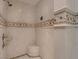 Elegant walk-in shower features decorative tile accenting and a built-in seat for added convenience at 2038 Cherry Creek Cir, Las Vegas, NV 89135