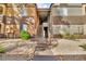 Condo exterior featuring a landscaped yard and a walkway to the units at 2200 S Fort Apache Rd # 1007, Las Vegas, NV 89117