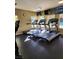 Well-equipped gym with cardio machines and windows at 2200 S Fort Apache Rd # 1007, Las Vegas, NV 89117