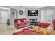 Living room with cozy furniture, TV, and a fireplace with a tile surround at 2200 S Fort Apache Rd # 1007, Las Vegas, NV 89117