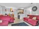 Open living room with tile flooring, furniture, and view to the kitchen and dining area at 2200 S Fort Apache Rd # 1007, Las Vegas, NV 89117