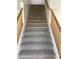 Carpeted staircase with wooden handrail ascending to the upper level at 2736 Stargate St, Las Vegas, NV 89108