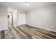 This bedroom features ample space and wood laminate flooring at 2851 S Valley View Blvd # 1150, Las Vegas, NV 89102