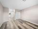 Bright bedroom with hardwood floors and a closet, creating a comfortable and functional living space at 2851 S Valley View Blvd # 1150, Las Vegas, NV 89102