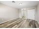 This bedroom features ample space, a closet with mirrored doors, and wood laminate flooring at 2851 S Valley View Blvd # 1150, Las Vegas, NV 89102