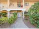 Inviting entryway with a well-manicured walkway leading to the front door of this charming condo at 2851 S Valley View Blvd # 1150, Las Vegas, NV 89102