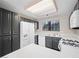 Modern kitchen with dark cabinets, stainless steel appliances, and sleek countertops at 2851 S Valley View Blvd # 1150, Las Vegas, NV 89102