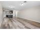 Spacious living room featuring hardwood floors, ample natural light, and open layout to the kitchen at 2851 S Valley View Blvd # 1150, Las Vegas, NV 89102