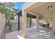 Backyard has covered patio with outdoor seating and a low-maintenance gravel yard at 301 Treehouse Ct, Henderson, NV 89012