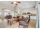 Open floor plan featuring living room and kitchen with modern appliances and wood flooring at 301 Treehouse Ct, Henderson, NV 89012