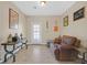 Living room includes guitars mounted on the wall, and a comfortable reclining sofa at 301 Treehouse Ct, Henderson, NV 89012