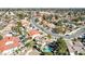 Expansive aerial view showcases a neighborhood with many tile roofs and pools, near downtown at 3431 Iberia St, Las Vegas, NV 89146
