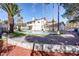 Multi-tiered backyard with brick paving and an elevated seating area, perfect for entertaining or enjoying quiet moments at 3431 Iberia St, Las Vegas, NV 89146