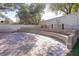 Wide-angle view of the outdoor sitting area with an elevated area for entertaining at 3431 Iberia St, Las Vegas, NV 89146