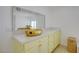 Bright bathroom with a gold sink and faucet along with bright, overhead lighting at 3431 Iberia St, Las Vegas, NV 89146