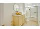 Bathroom featuring gold colored hardware, tiled floors, and shower stall at 3431 Iberia St, Las Vegas, NV 89146
