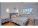 Bedroom features light-colored walls, wood-like floors, and a comfortable queen bed at 3431 Iberia St, Las Vegas, NV 89146