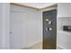 Walk-in closet with wood rod, shelving, a safe, and a light to illuminate the space at 3431 Iberia St, Las Vegas, NV 89146