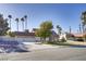 A beautiful single-Gathering home with a three-car garage surrounded by lush landscaping at 3431 Iberia St, Las Vegas, NV 89146