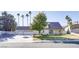 Charming home with a three-car garage and a well-manicured front lawn adorned with mature trees, adding to its curb appeal at 3431 Iberia St, Las Vegas, NV 89146