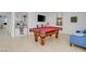 Fun game room with a pool table, a bar, and an entertainment center at 3431 Iberia St, Las Vegas, NV 89146