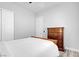 This bedroom features wood-look flooring and a wooden dresser at 351 Dandelion Brook Ct Ct, Las Vegas, NV 89148