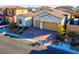 Picture of a single-story home with a two car garage, manicured lawn and desert landscaping at 351 Dandelion Brook Ct Ct, Las Vegas, NV 89148