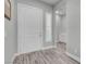 Welcoming foyer with a white door, shuttered window, and tiled floors at 351 Dandelion Brook Ct Ct, Las Vegas, NV 89148