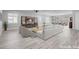 Spacious living room with a plush sofa, comfortable armchairs, and entertainment center, perfect for relaxation at 351 Dandelion Brook Ct Ct, Las Vegas, NV 89148