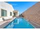 This house features a private swimming pool and covered patio at 351 Dandelion Brook Ct Ct, Las Vegas, NV 89148