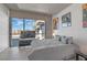 Bedroom featuring a queen bed, TV and modern decor, with a window view at 353 E Bonneville Ave # 752, Las Vegas, NV 89101