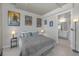 Comfortable bedroom features city views and a connection to the bathroom at 353 E Bonneville Ave # 752, Las Vegas, NV 89101